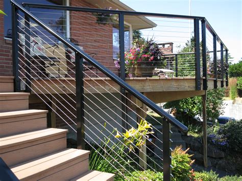 Glass balustrade with metal handrails set. Deck Railing Ideas