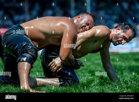 Wrestlers Battle For Supremacy At The Elmali Turkish Oil Wrestling Festival In Turkey Stock