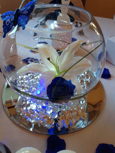 Maybe you would like to learn more about one of these? Fresh flowers | Blue wedding theme centerpieces, Blue themed wedding, Silver wedding decorations