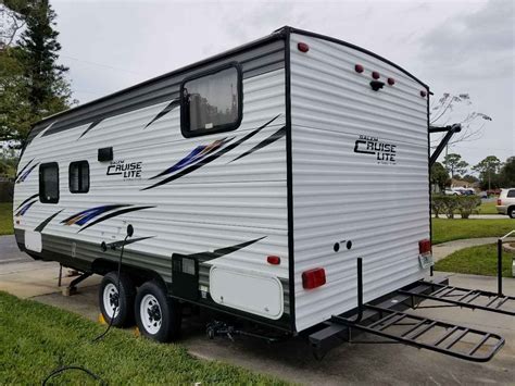 The kitchen has a double bowl undermount sink, a 3 burner stovetop with an oven. 2017 Used Forest River SALEM CRUISE LITE 201BHXL Travel ...