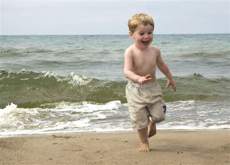 Laughing Toddler On Beach Stock Image Image Of Play 34913307