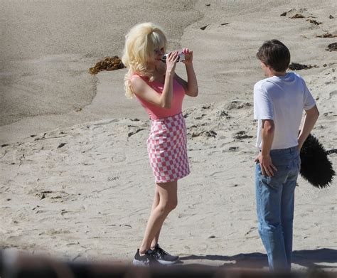 Emmy Rossum Films Scenes As The Iconic Angelyne On The Beach In Malibu