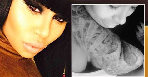 Is Rob Kardashians Arm Around Blac Chyna Man With Identical Tattoos Appears In Intimate Snap