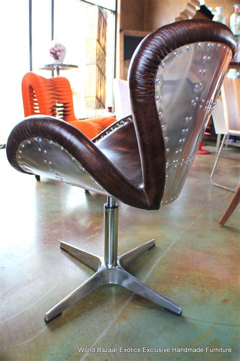 Like that the faux leather has some distressing for a more authentic look. Aviator modern swivel Leather dining chair vintage cigar ...