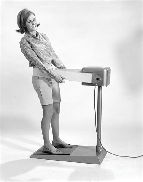 Woman In Weight Reducing Contraption Photograph By H Armstrong Roberts