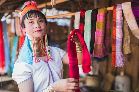 A Long Neck Tribal Woman Showing Silk Handmade Clothes Del