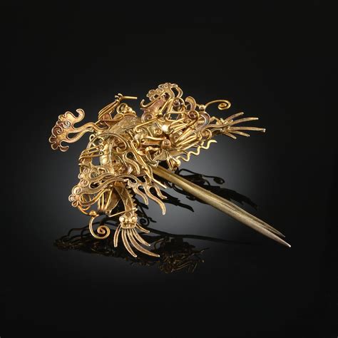 A Pair Of Chinese Hair Pins 20th Century Each A Highly Stylized