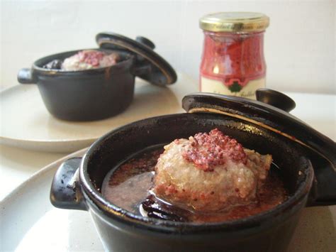 Paupiettes de veau en cocotte aux pruneaux et à la moutarde de cassis