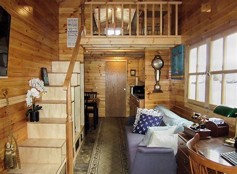 tiny cabin  wheels  realwood tiny homes