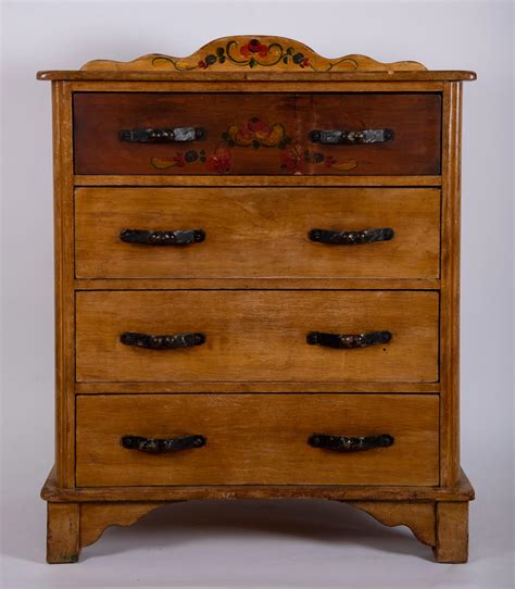Lot - Monterey Furniture Four Drawer Chest Height: 43 inches; Width: 34 1/2 inches; Depth: 18 inches