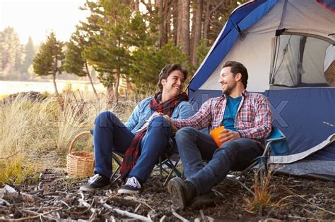 male gay couple on autumn camping trip stock image colourbox