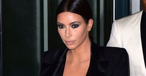 kim kardashian braves the cold in sexy cleavage bearing dress huffpost style