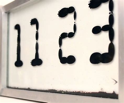 Funny Work Time Clock Ferrofluid Clock Tara