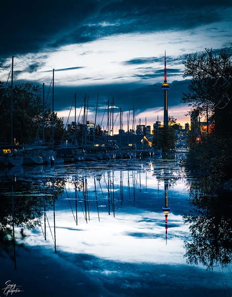Tower Boats Water Reflection Twilight Hd Phone Wallpaper Peakpx