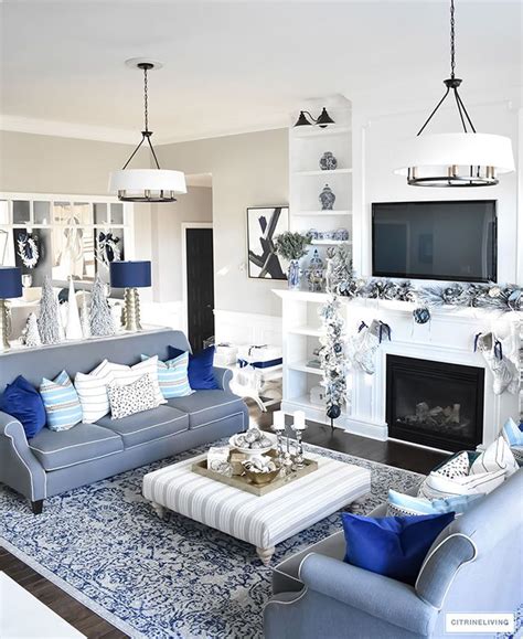 The rug makes my living room super warm even though blue is naturally a cool color. CHRISTMAS HOME TOUR : LIVING ROOM WITH BLUE, WHITE AND ...