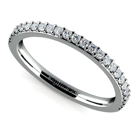 Your wedding band is just as important as that sparkly engagement ring on your finger. Curved Diamond Wedding Ring in White Gold