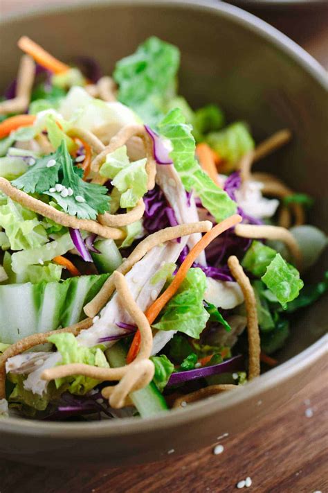 Lightly dressed chinese chicken salad with grilled chicken, crunchy wontons, toasted almonds, and sprinkled with sesame seeds over a crunchy napa cabbage and carrot salad. Chinese Chicken Salad Recipe with Vinaigrette Dressing ...