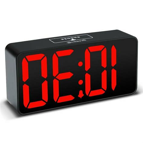 Click the alarms & clock icon. DreamSky Compact Digital Alarm Clock with USB Port