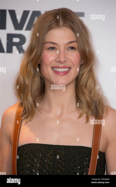 British Actress Rosamund Pike Poses For Photographers Upon Arrival For