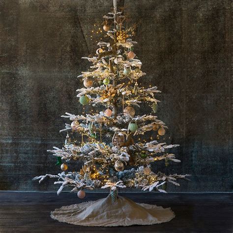This stately tree is composed of high quality tips in an emerald green shade and features the same full, symmetrical shape that has made natural noble firs such a popular choice for christmas trees. Strikingly natural, each of these flocked faux trees is ...