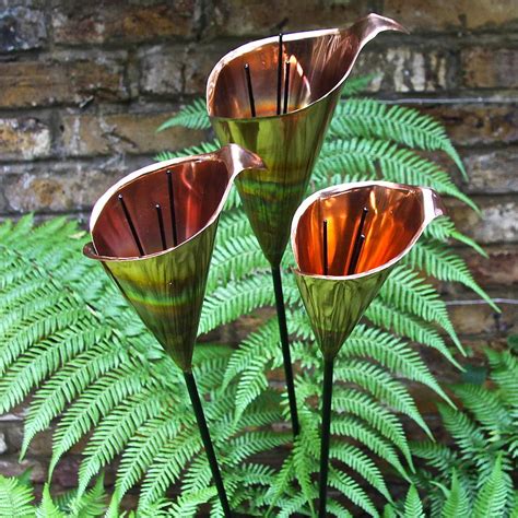 Buy garden statues & ornaments online! copper lily garden sculptures by london garden trading | notonthehighstreet.com