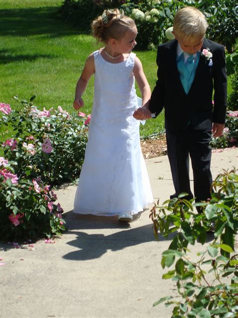 Ourweddings I Love The Look This Girl Is Giving The Boy Flower Girl