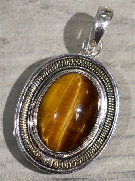 Tigers Eye Sterling Silver And Bronze Accented Oval Pendant