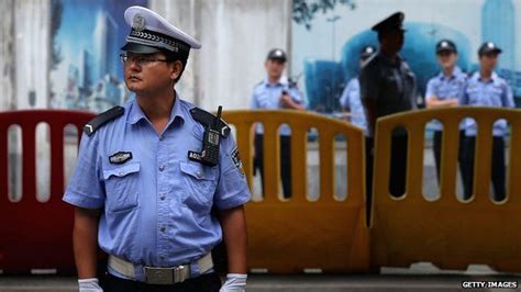 china fake cops guard government building bbc news