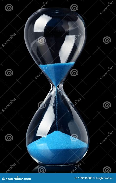 Hourglass With Blue Sand Showing The Passage Of Time Stock Image