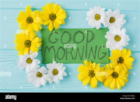 Good Morning Note And Golden Daisy Flowers Composition Top View Flat