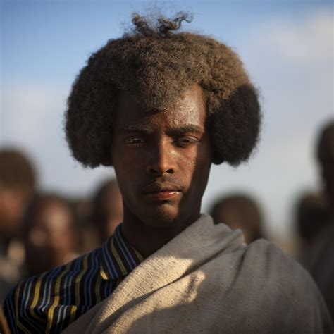Portrait Of A Tired Karrayyu Tribe Man With His Gunfura Traditional
