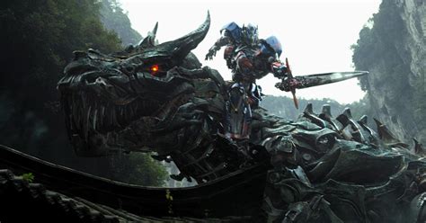 Optimus Prime Riding A Giant Dinosaur In Latest Trailer