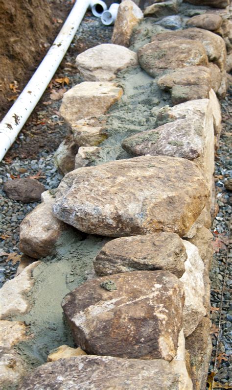 The photo below shows the wall i am going to be working on. Artistic-Landscapes.com Blog » Retaining wall built with ...