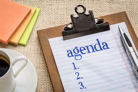 agenda list on clipboard and coffee - Roy Connection