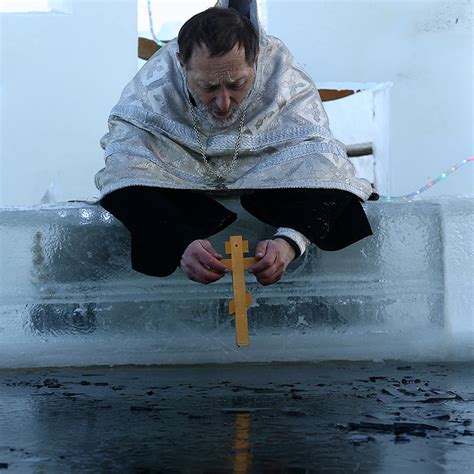 Russian Orthodox Epiphany Christians Plunge Into Frozen Rivers And Lakes In Subzero