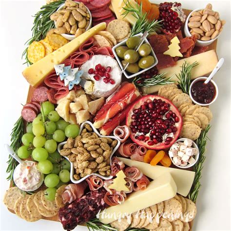 Trisha's cheese log is an ideal snack or appetizer for holiday entertaining. How to Make a Charcuterie Board | Hungry Happenings