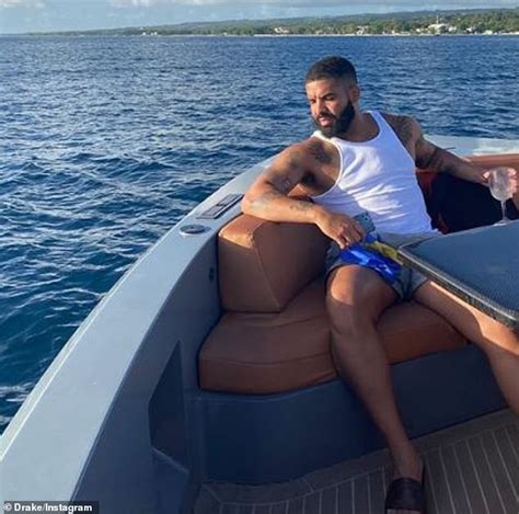 Drake Shows Bulging Biceps In Tank Top As He Enjoys Relaxed Day With