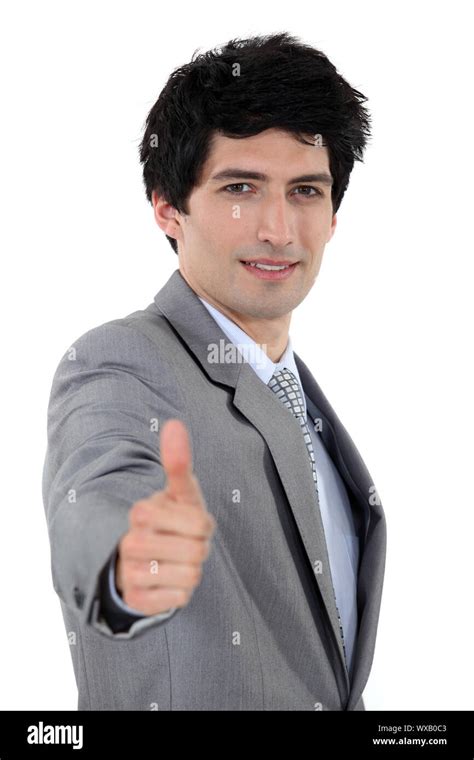 Businessman Giving Thumbs Up Stock Photo Alamy