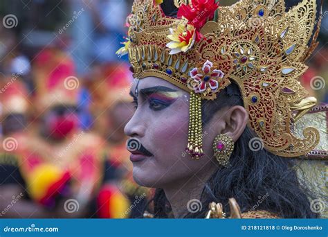 Balinese Man Dressed In National Costume Participates In Street Ceremony In Island Bali