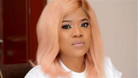 Nollywood Actress Toyin Abraham Strikes Cute Pose With Husband