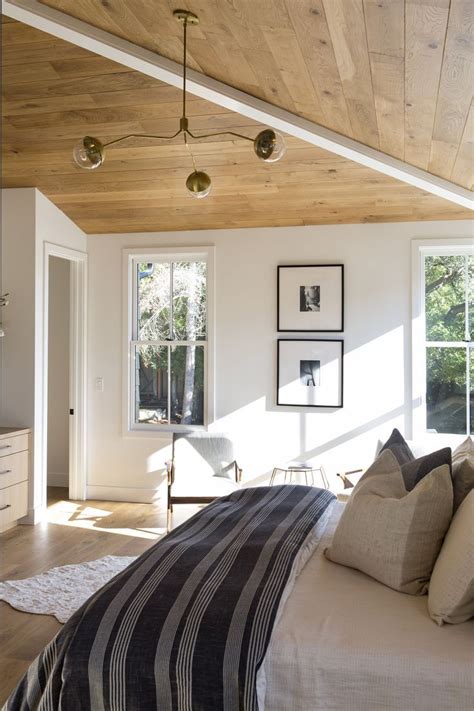 Shop ceilings and more at the home depot. Wooden paneling on the vaulted ceiling Brass three arm ...