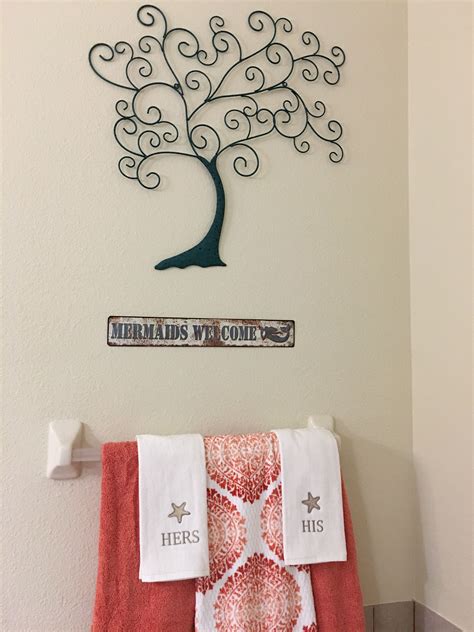bathroom decor hobby lobby metal wall art and towels from kohls all