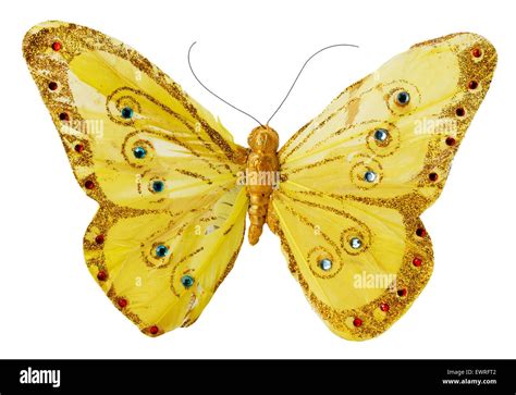 Mariposa dorada artificial aislado en el fondo blanco fotografía de