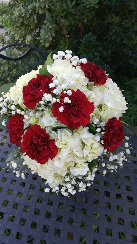 White Hydrangea Burgundy Carnations And Babies Breath Bridal Bouquet