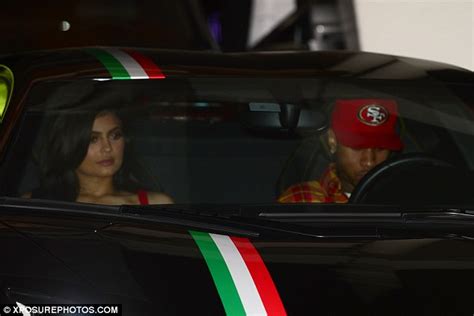 Kylie Jenner Wears Red Dress As She Jumps Into A Lamborghini With Tyga