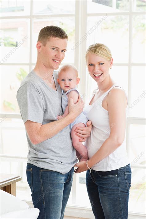 Portrait Of Parents Holding Baby Stock Image F0091146 Science