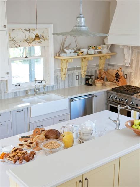 The rustic wood accent wall is made up of discarded planks from the renovation. Photo Page | HGTV
