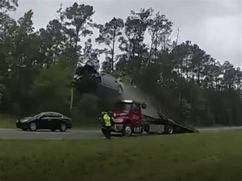 Video A Drivers Car Soared 120 Feet After Vaulting Off Of A Tow Truck