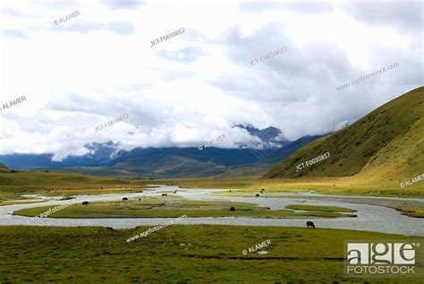 China Qinghai Eastern Landscape River And Mountains Stock Photo