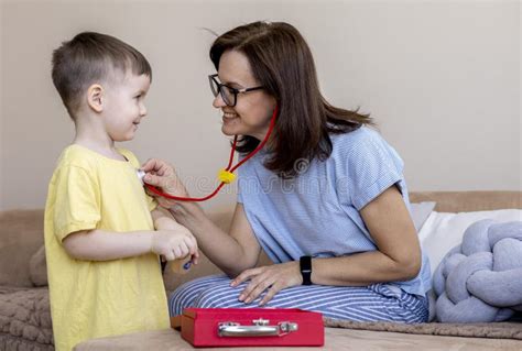 Montessori Material Mom And Son Play Doctor Stock Photo Image Of
